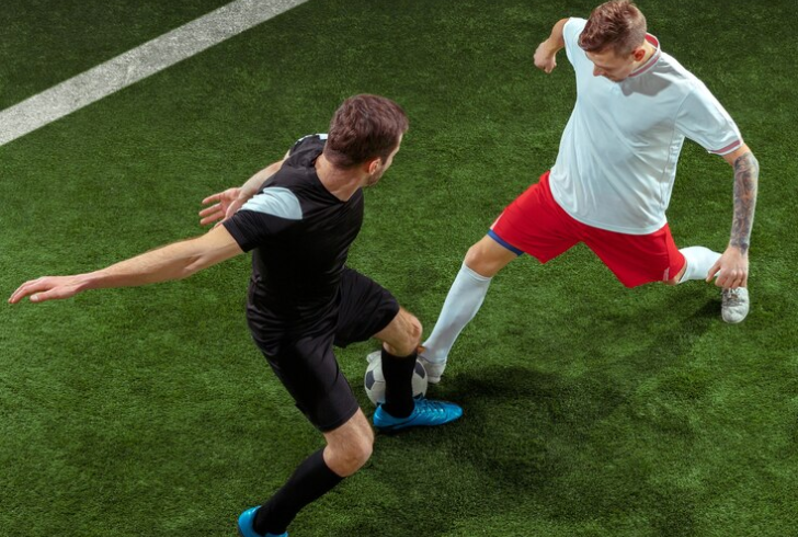 To excel in ball control, train your feet to receive and manipulate the ball effectively