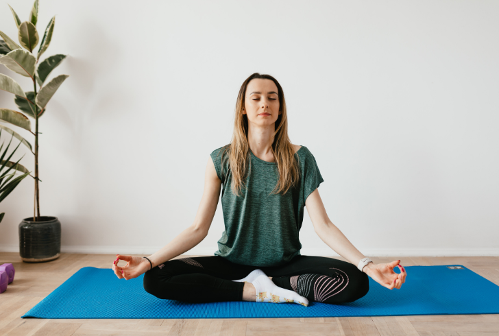 Woman practicing yoga for body and mind
